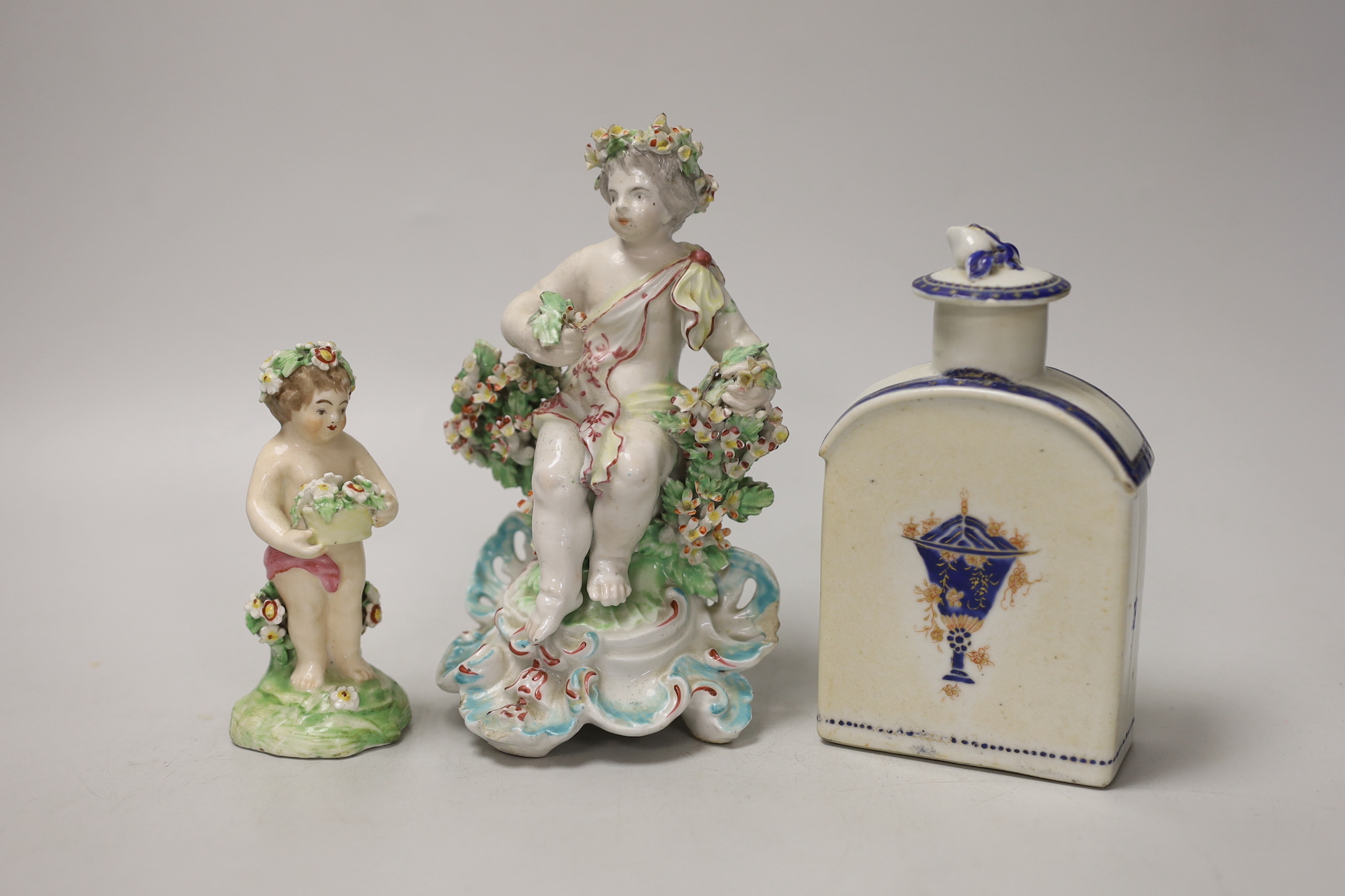 Two late 18th century Derby figures of cherubs and a Chinese Export porcelain caddie and cover